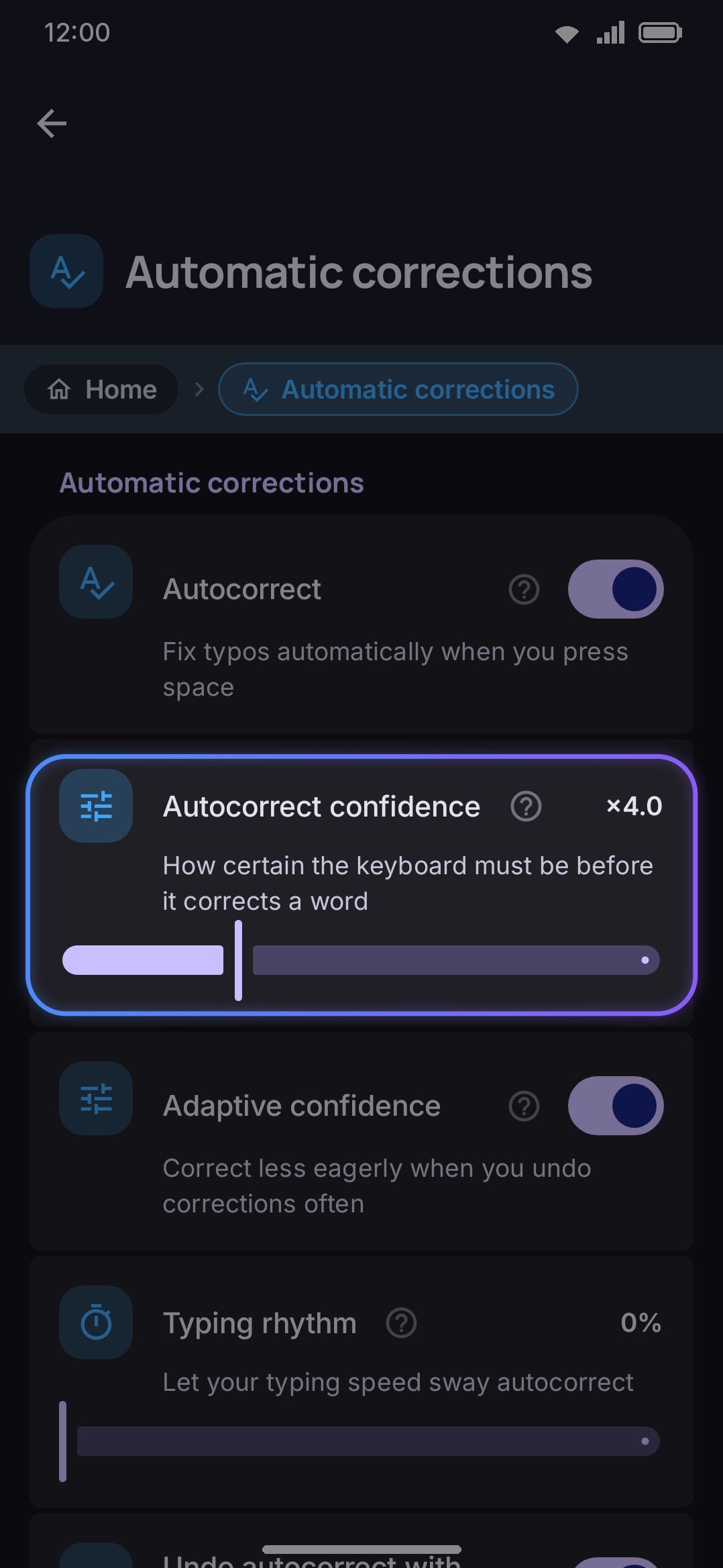 The Automatic corrections group in Typing settings, including the confidence slider.