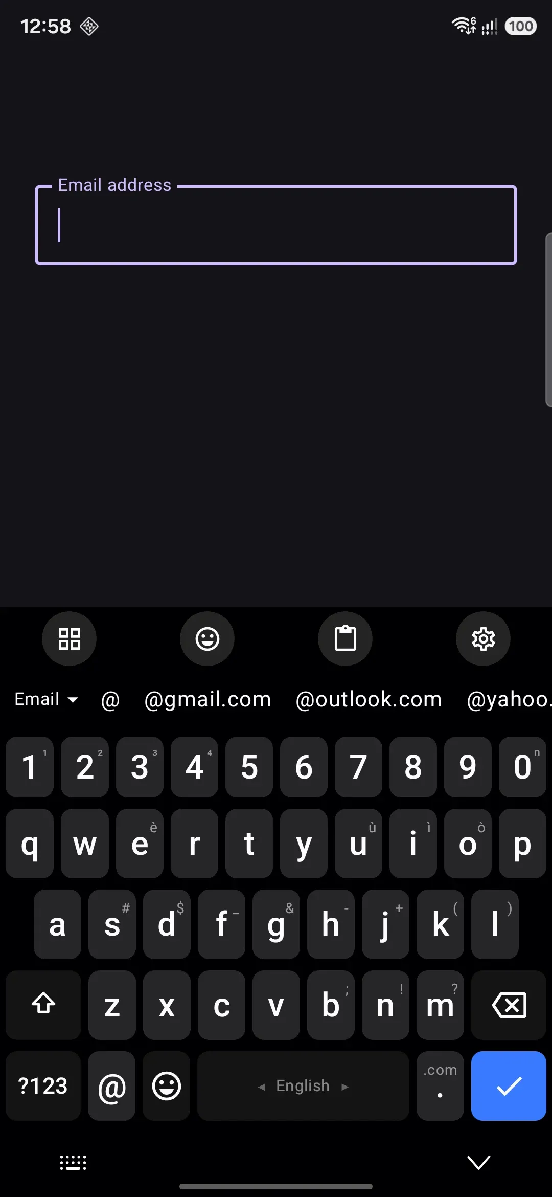 An email field: the bottom-row comma has become @, and the period key's long-press offers .com, .net, .org, .edu, .co.