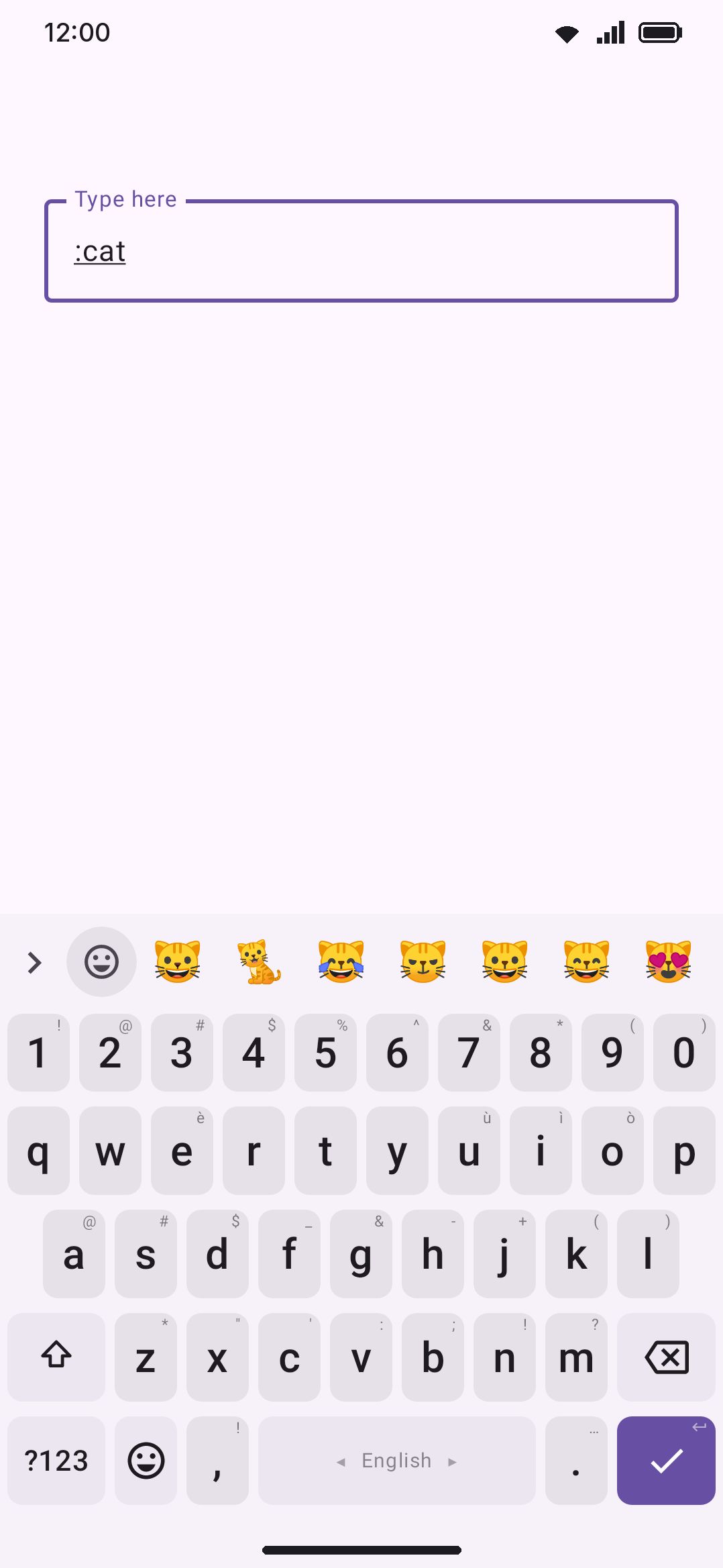 Typing a colon turns the suggestion strip into emoji search results.