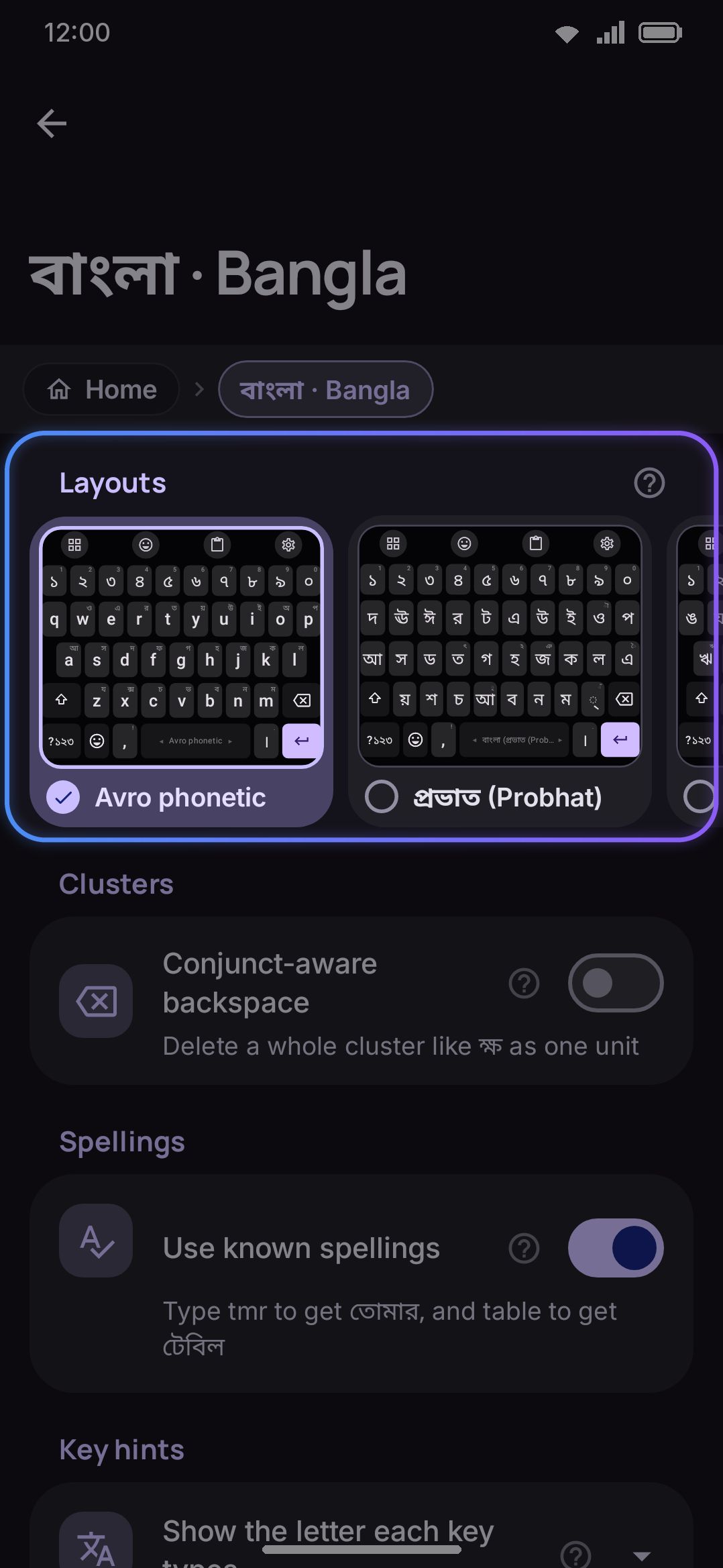 A language's own screen: a row of layout cards, numeral system, and other enabled languages to suggest from.