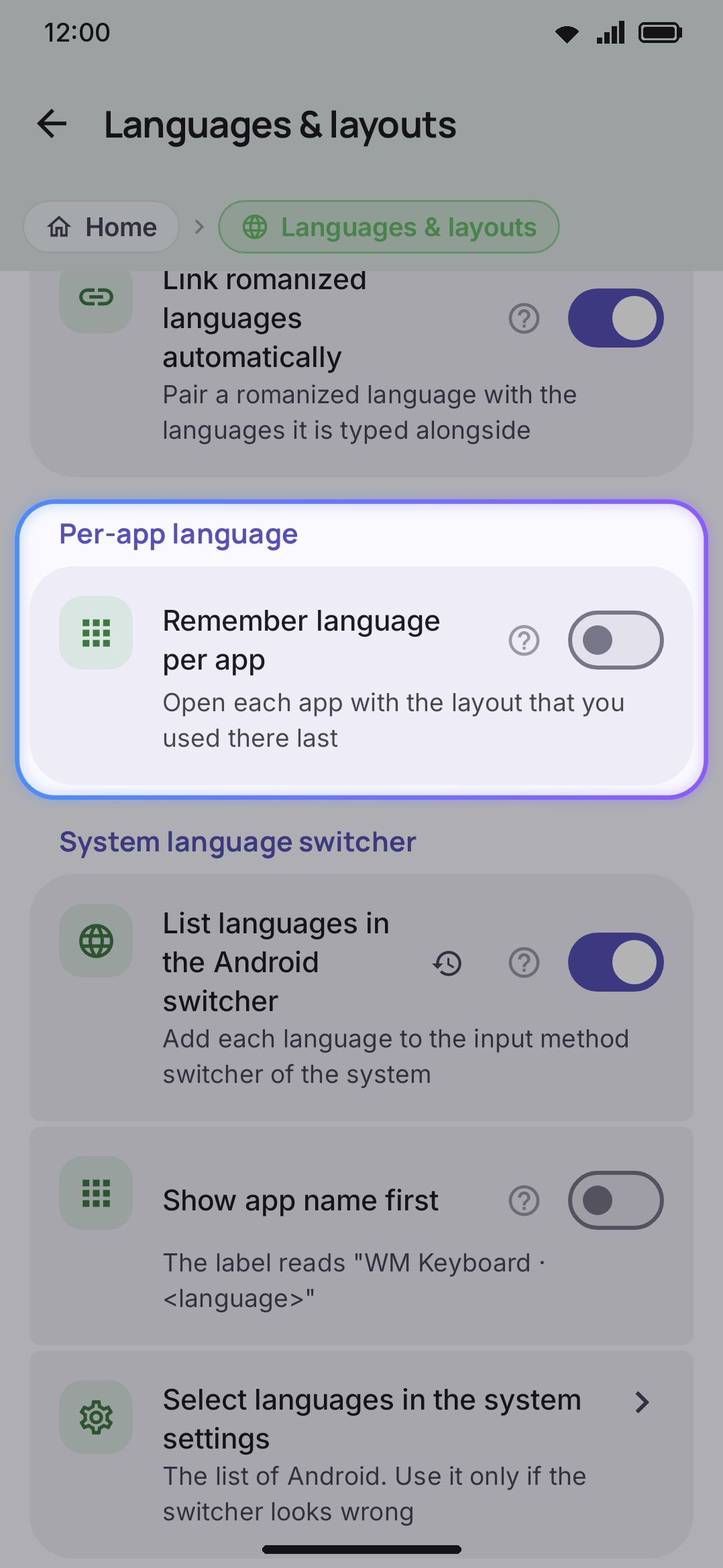 Further down the Languages screen: per-app language memory and the Android system switcher toggle.
