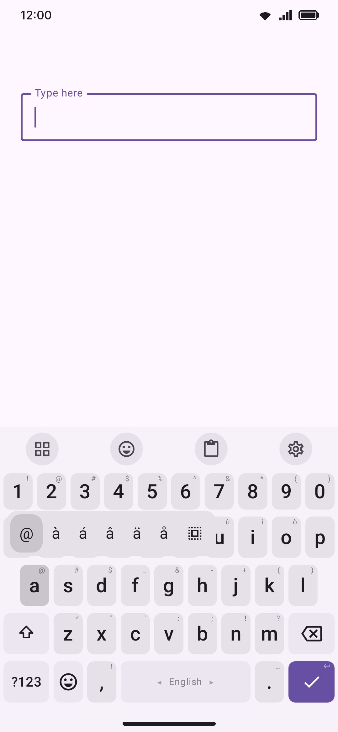 Long-pressing a key with alternates pops up the accented and symbol variants.