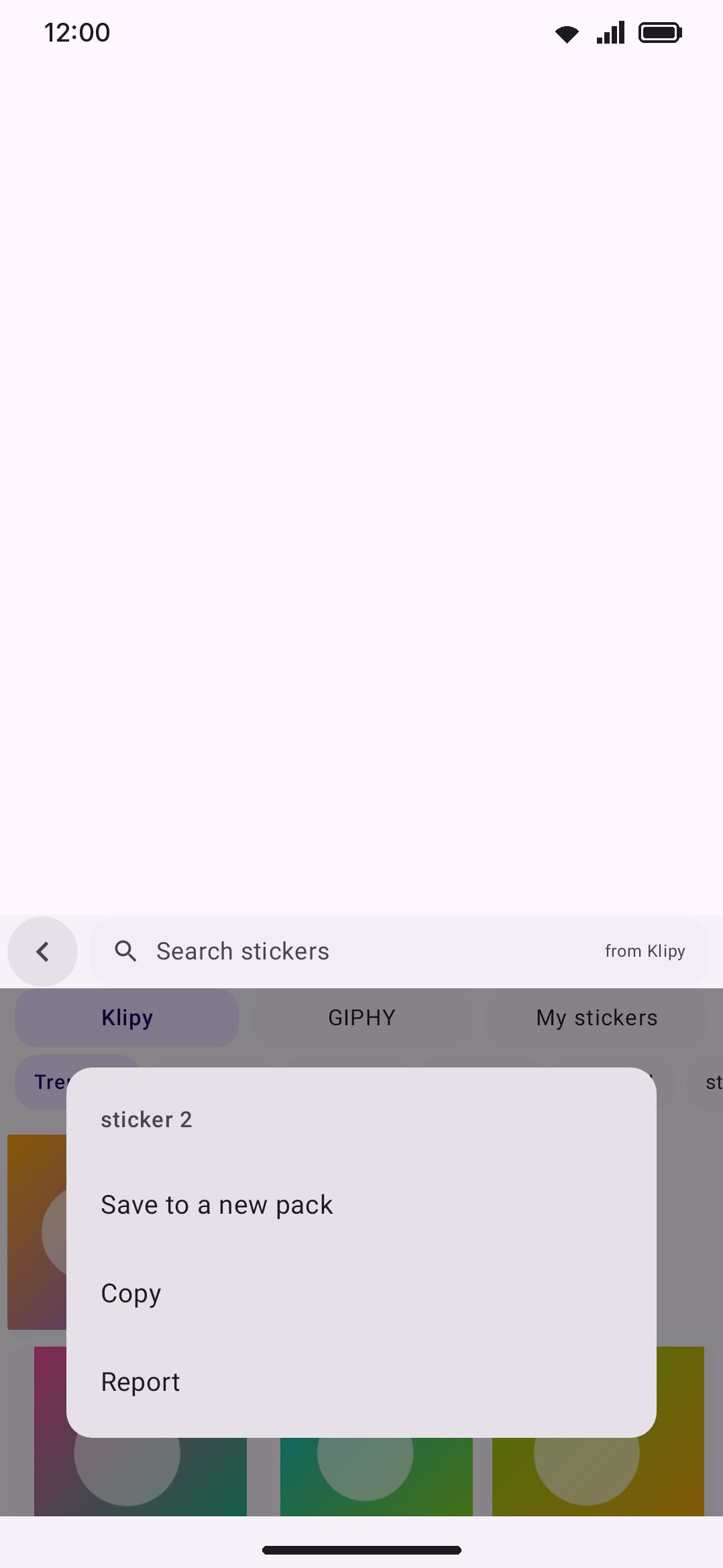 Long-press menu over a Klipy result: save to a pack, copy, or report.